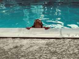 person inside swimming pool looking up